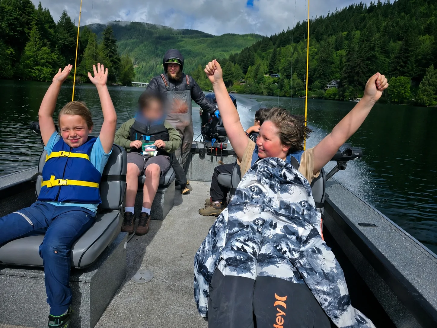 Youth enjoying a boat ride during PNW Provides Kids Fishing Day